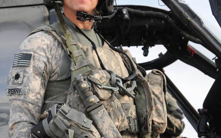 Republican Scott Perry, who is running for a U.S. House seat in Pennsylvania’s 4th district pictured with a Blackhawk helicopter in 2012. Perry is a helicopter pilot and a colonel in the Pennsylvania Army National Guard, who flew 44 missions and served 200 combat hours in the Iraq War during 2009 and 2010.