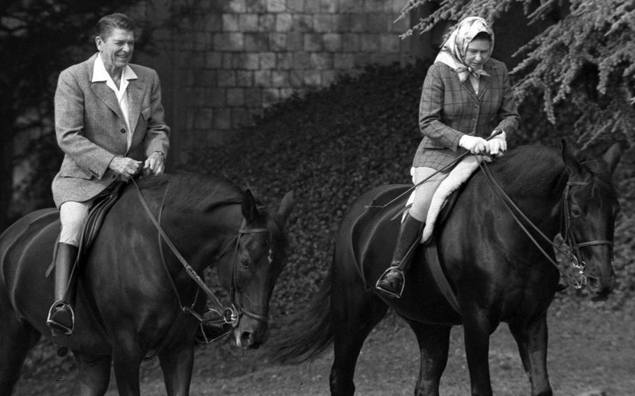 President Ronald Reagan and Queen Elizabeth II, out for a ride at Windsor Castle in 1982.