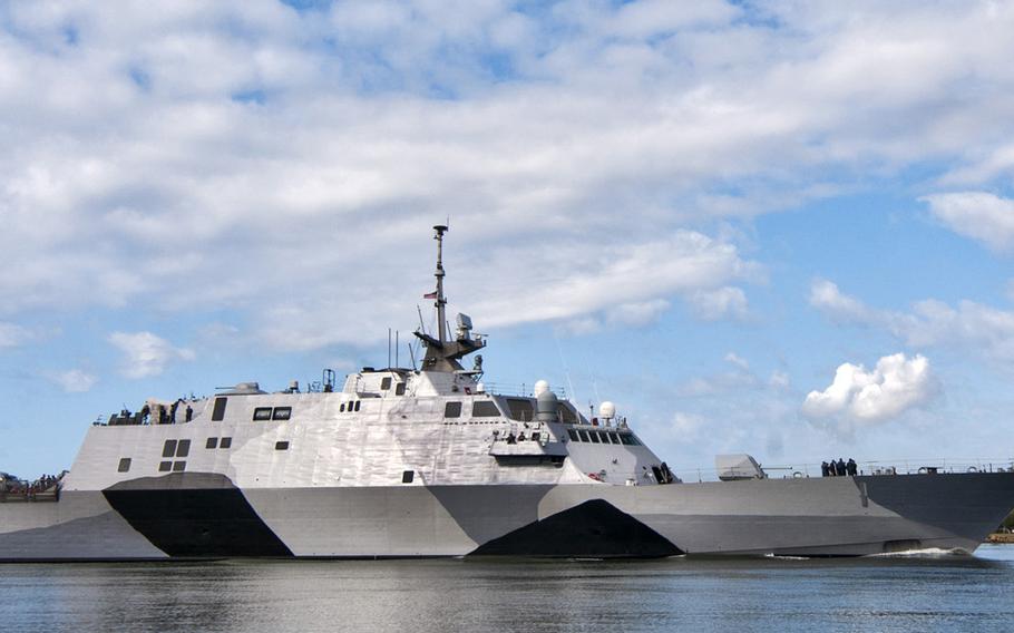 In this photo provided by the U.S. Navy, the USS Freedom littoral combat ship pulls into Pearl Harbor, Hawaii. The USS Freedom, which  is stopping in Hawaii on its way to a deployment to Singapore, has advantages bigger U.S. Navy ships lack.