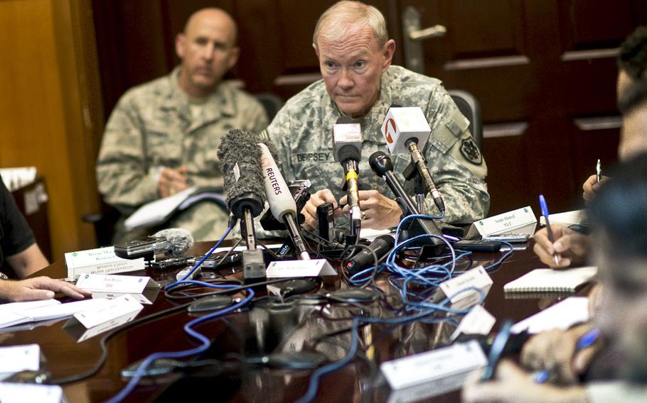 Chairman of the Joint Chiefs Gen Martin E. Dempsey conducts a press conference in Kabul, Afghanistan, Jul 22, 2013.