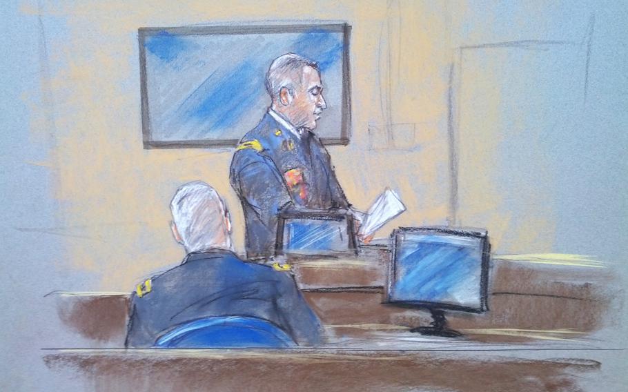 In this sketch by courtroom artist Brigitte Woolsey, prosecutor Maj. Larry Downend reads a statement by Sgt. Mark Todd to the panel of military officers acting as a jury in the case against Maj. Nidal Hasan. Todd is reportedly unable to speak due to a medical condition. 
