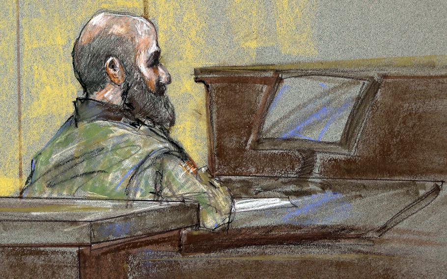 In this courtroom sketch, U.S. Army Maj. Nidal Malik Hasan is shown as the guilty verdict is read at his court martial, Friday, Aug. 23, 2013, in Fort Hood, Texas.