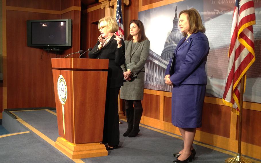 Sen. Claire McCaskill, D-Mo., speaks in November 2013 about a bipartisan amendment to strengthen and augment the package that passed the Armed Services Committee in June to curb military sexual assault. With her are Sen. Kelly Ayotte, R-N.H., and Sen. Deb Fischer, R-Neb.