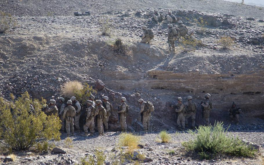 U.S. Marines train at Marine Corps Air Ground Combat Center in Twentynine Palms, Calif., in July 2013. A NCIS probe has concluded that a 20-year-old Marine who died there in March during pre-deployment training was killed by a bulldozer as he slept in a hand-dug foxhole.
