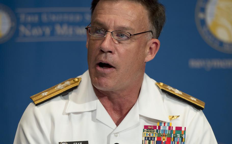 Rear Adm. Sean Buck, the Director of the 21st Century Sailor Office, responds to questions at a sexual assault prevention panel held at the United States Navy Memorial, Washington July 31, 2013.