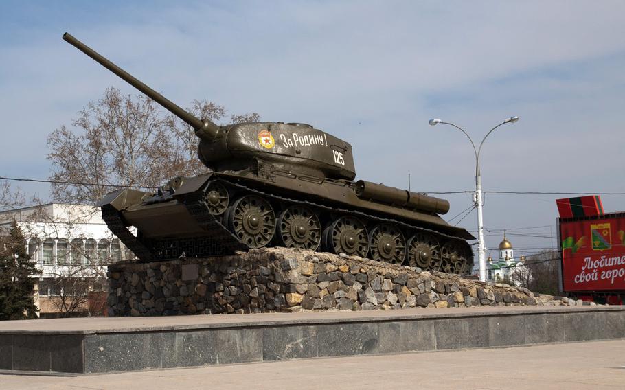 A Russian tank turned into a war memorial, in central Tiraspol, is seen March 23, 2014, in the soviet Republic of Trans-Dniester, a sliver of contested land that declared its independence from Moldova, Europe's poorest nation, back in 1990 but is yet to be recognized by any government around the world. With a population of just half a million, a mix of ethnic Russians, Moldovans and Ukrainians, Trans-Dniester is little more than a blip on the map, but in recent weeks it has become the focus of much political attention.