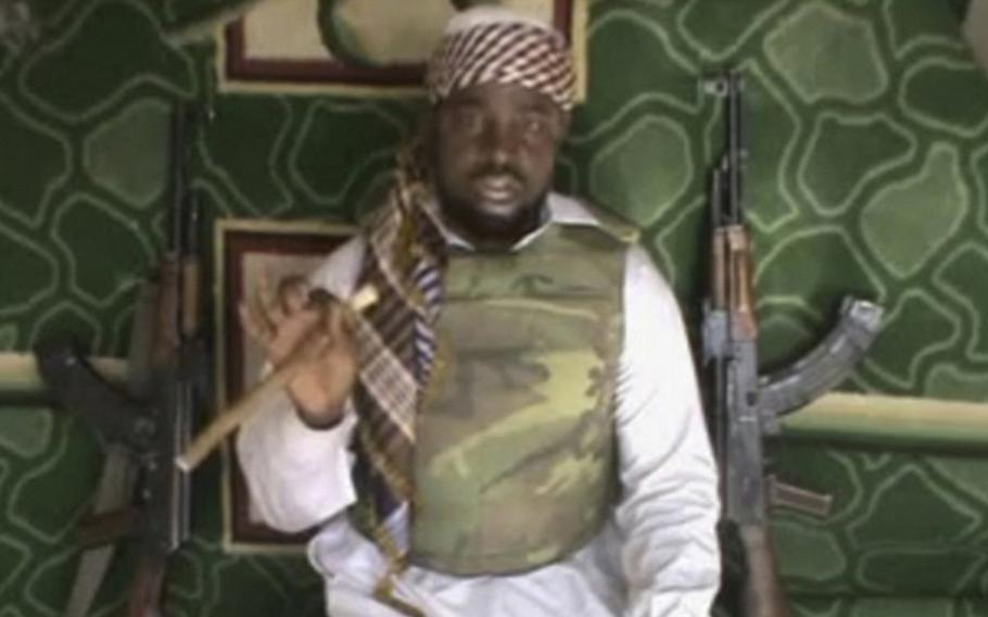 This file image made available Wednesday, Jan. 10, 2012, taken from video posted by Boko Haram sympathizers, shows the leader of the radical Islamist sect Imam Abubakar Shekau. 