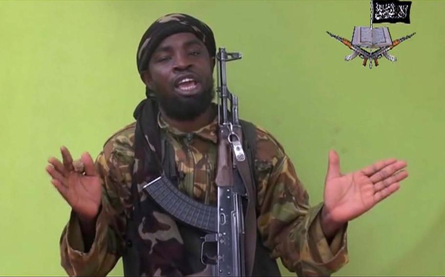 Abubakar Shekau, leader of Nigeria's Boko Haram, speaks in a video taken from the terrorist group's website on Monday May 12, 2014.
