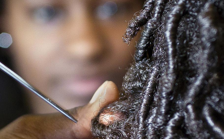 The Marine Corps Uniform Board has released a survey to get feedback about whether two banned hairstyles for women — dreadlocks and twists – should be allowed.