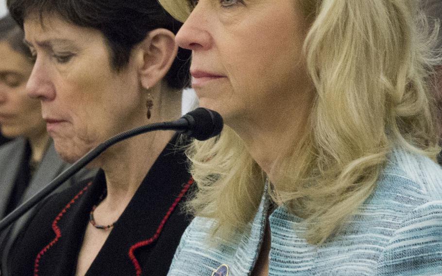 Allison A. Hickey, right, the Department of Veterans Affairs' undersecretary for benefits, at a House Appropriations subcommittee hearing on March 4, 2015. With her is Carolyn M. Clancy, the VA's interim undersecretary for health.