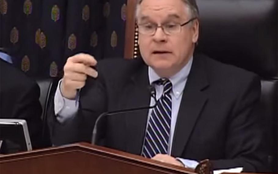 In this image taken from video, Rep. Christopher Smith (R-N.J.) addresses Susan Jacobs, State Department special adviser for children's issues, at a House Foreign Affairs Subcommittee on Human Rights hearing Wednesday, March 25, 2015.