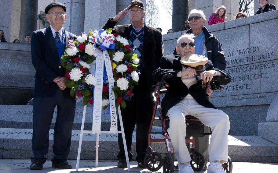 Veterans who fought in the Battle of Okinawa lay a wreath at the World War II Memorial to commemorate the 70th anniversary of the battle on April 1, 2015.