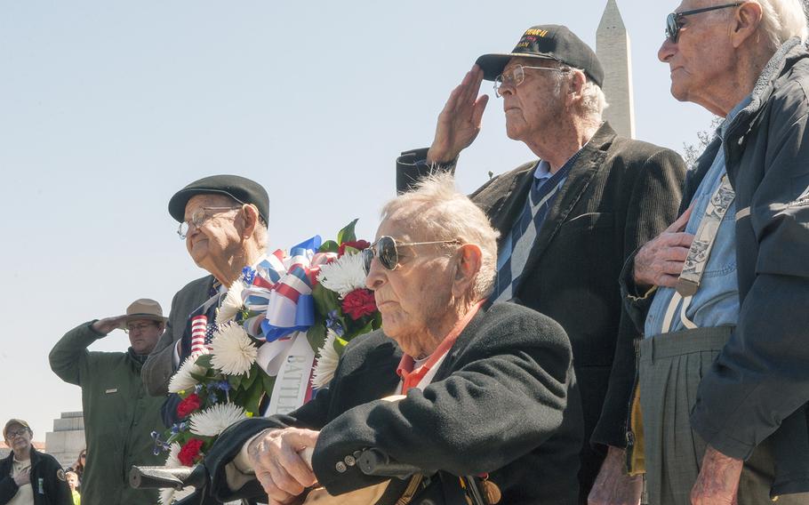World War II veterans attend a ceremony commemorating the 70th anniversary of the Battle of Okinawa at the WWII Memorial in Washington, D.C., on Wednesday, April 1, 2015. 