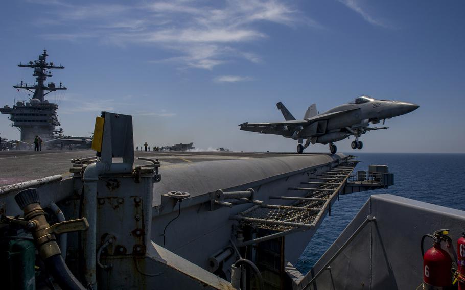 An F/A-18E Super Hornet launches from the aircraft carrier USS Carl Vinson flight deck on March 28, 2015. Carl Vinson is deployed as part of the Carl Vinson Strike Group supporting maritime security operations, strike operations in Iraq and Syria.