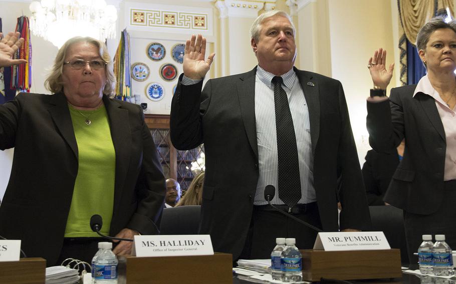 Linda Halliday, Assistant VA Inspector General for Audits and Evaluations; Danny G. I. Pummill, principal deputy under secretary for benefits of the Veterans Benefits Administration; and Diana Rubens, Director of the VA's Philadelphia Regional Office are sworn in during Wednesday's House Committee on Veterans Affairs hearing on problems at VA facilities in Philadelphia and Oakland, Calif.