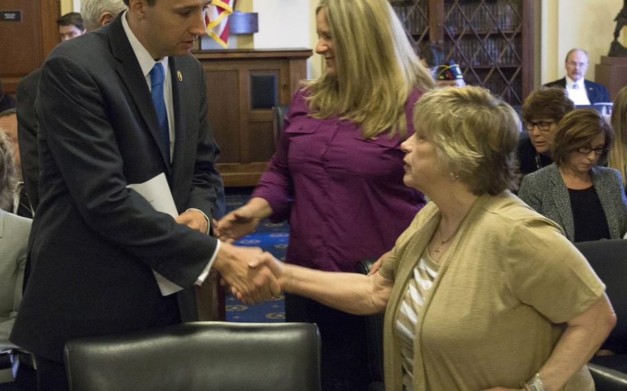 Rep. Ryan Costello, R-Pa., shakes hands with whistleblower Diana Blender before Wednesday's House Committee on Veterans Affairs hearing on problems at VA facilities in Philadelphia and Oakland, Calif.