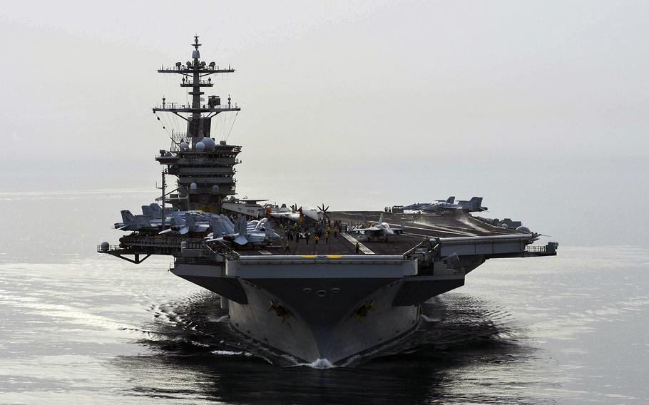 The USS Theodore Roosevelt sails in the U.S. 5th Fleet area of operations on April 16, 2015, as it supports strike operations in Iraq and Syria, as well as maritime security operations efforts. The aircraft carrier is keeping an eye on a floatilla of Iranian ships maneuvering in the area.