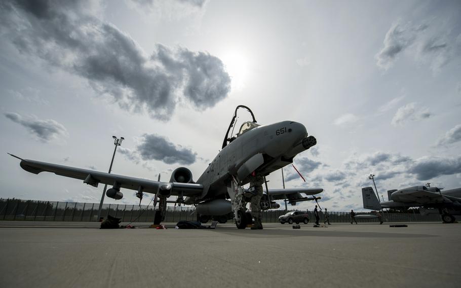 A member of the 354th Expeditionary Fighter Squadron performs an post flight inspection on an A-10 Thunderbolt II attack aircraft May 1, 2015, at Ämari Air Base, Estonia. 