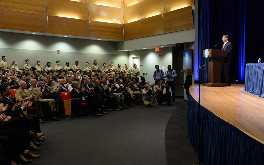 Defense Secretary Ash Carter participates in the LGBT Pride Month ceremony and gives the keynote address in the Pentagon Auditorium on Tuesday, June 9, 2015.