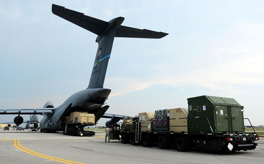 Cargo bound for Incirlik Air Base, Turkey, in support of Operation Inherent Resolve is loaded onto a C-5 Super Galaxy assigned to the 436th Airlift Wing, Aug. 8, 2015, at Aviano Air Base, Italy.