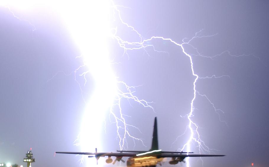 Lightning strikes in front of the tower and a taxing C-130 at Balad Air Base, Iraq, on May 16, 2015. Army Ranger School students and instructors hospitalized after lightning strikes during a training exercise at Eglin Air Force Base, Fla., have been released, the Army said Thursday, Aug. 13, 2015.