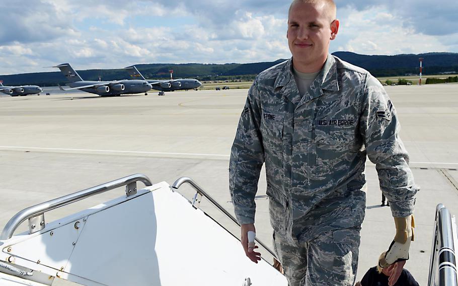 Airman 1st Class Spencer Stone boards a KC-135 Stratotanker Sept. 3, 2015, at Ramstein Air Base, Germany. Stone departed Ramstein after receiving medical treatment at Landstuhl Regional Medical Center for injuries sustained while stopping a gunman aboard an Amsterdam-to-Paris train. For his actions, Stone will receive the Purple Heart and the Airman’s Medal.