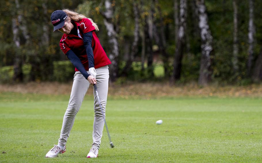 Kaiserslautern's Jasmin Acker takes a shot from the fairway during the DODDS-Europe golf championship at Rheinblick golf course in Wiesbaden, Germany on Thursday, Oct. 8, 2015. Acker, a sophomore, won the girls' division after finishing third place last year.