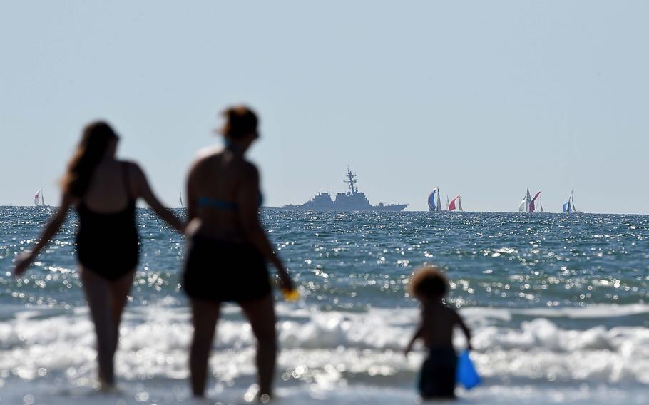 A family enjoys Gator Beach as an Arleigh Burke-class guided-missile destroyer is underway off the coast of southern California Nov. 7, 2015. 