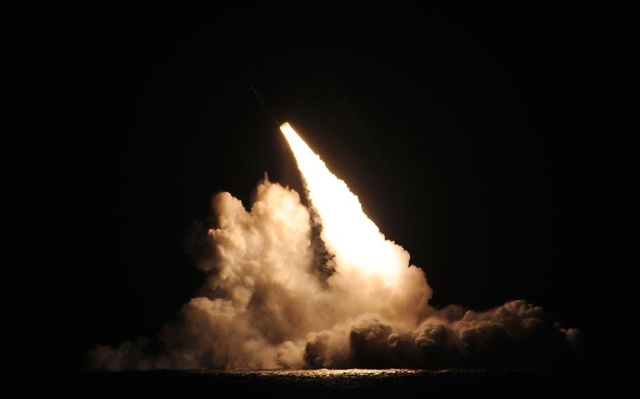 A trident II D-5 ballistic missile is launched from the Ohio-class ballistic missile submarine USS Kentucky during a missile test at the Pacific Test Range Nov. 7, 2015. 