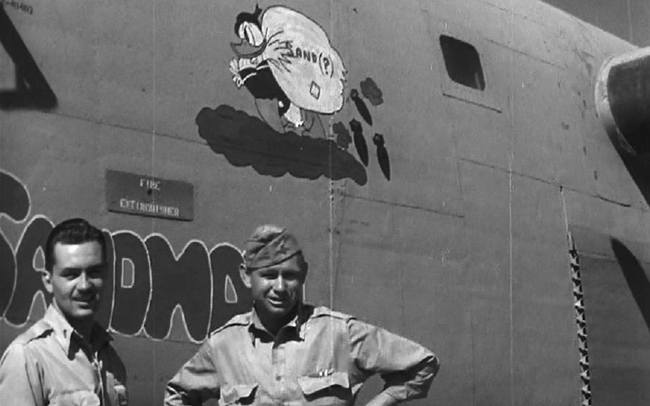 Then-1st. Lt. Robert Sternfels, left, and his co-pilot, 2nd Lt. Barney Jackson stand in front of their B-24 Liberator "The Sandman" in Benghazi, Libya, in 1943, prior to the launch of "Operation Tidal Wave." Sternfels was 23 when his 98th Heavy Bombardment Group joined four others in the August 1, 1943, massive airstrike against Hitler's oil refineries in Ploesti, Romania.