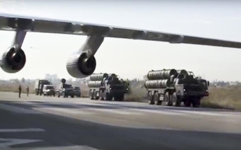 A video screen grab shows Russian S-400 air defense missile systems on the runway at the Hemeimeem air base in Syria in November 2015. Activists in Syria said Thursday, Dec. 3, that Russian forces are expanding on a second air base in Syria.