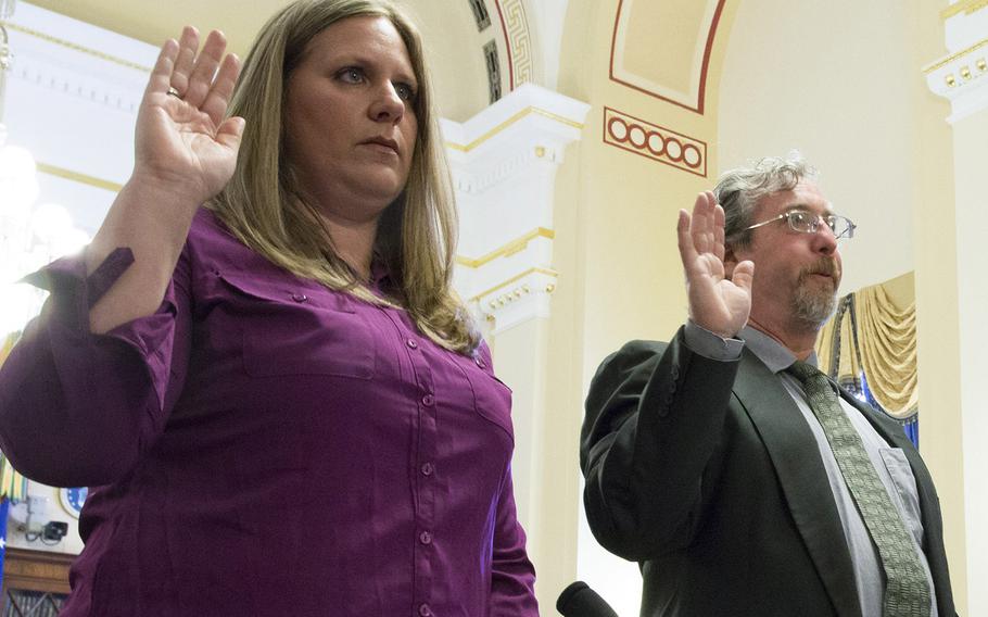 Quality review specialist Kristen Ruell and union representative Joe Malizia of the Philadelphia office are sworn in before a House hearing in April, 2015.