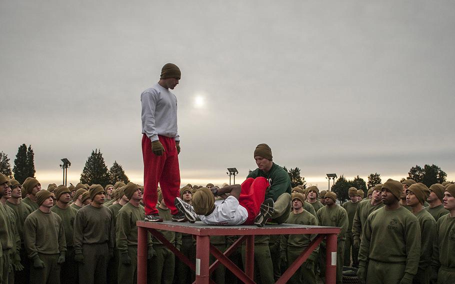 Marine officer candidates attending Officer Candidate Class-220 complete their initial Physical Fitness Test  at Brown Field at Marine Corps Base Quantico, Va., on Jan. 20, 2016. 