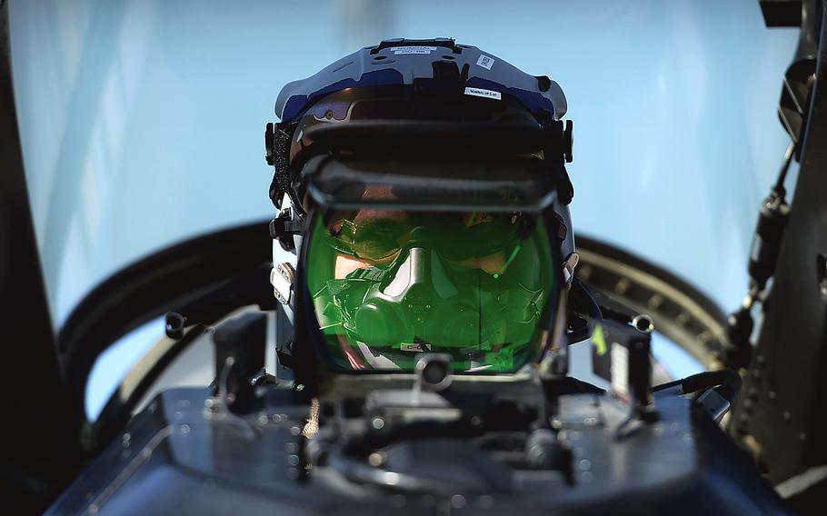 A U.S. pilot prepares for a mission in the cockpit of an F-16 Fighting Falcon at Bagram Air Field in Afghanistan in November 2015. U.S. military officials said Thursday, Feb. 11, 2016, that coalition airstrikes and operations are increasing  against an estimated 1,000 to 3,000 Islamic State fighters in Afghanistan.