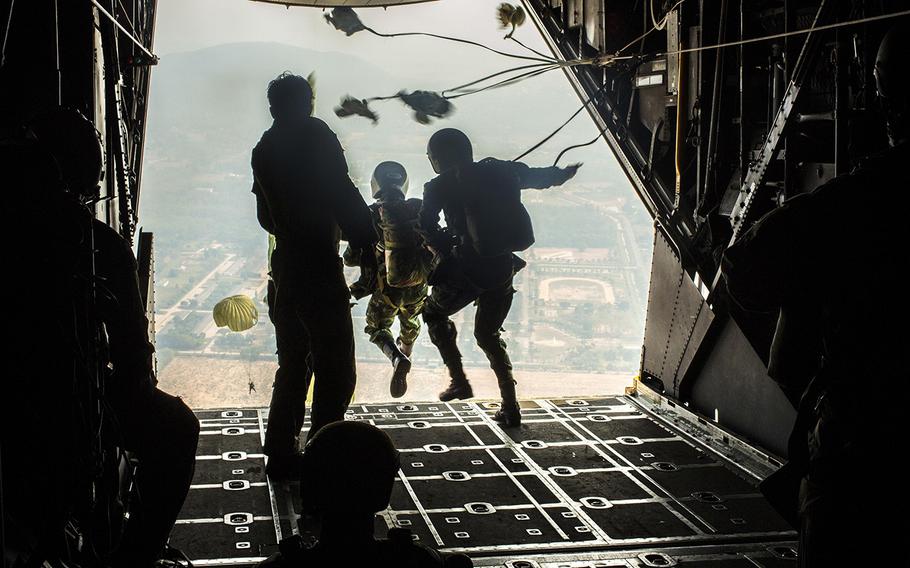 U.S. and Royal Thai Special Forces conduct a partnership airborne exercise from an MC-130 Hercules in Phitsanulok District, Thailand, during exercise Cobra Gold, Feb. 16, 2016. Cobra Gold is a multinational training exercise developed to strengthen security and interoperability among the Kingdom of Thailand, the U.S. and other participating nations. 