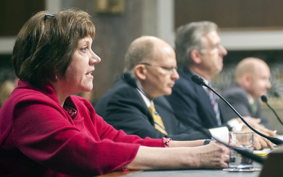 Bernadette Loftus, an associate executive director with the Mid-Atlantic Permanente Medical Group, testifies during a Senate hearing on Capitol Hill in Washington, D.C., on Tuesday, Feb. 23, 2016. Other witnesses joining Loftus in the first of two panel sessions before the Committee on Armed Services' Subcommittee on Personnel are from left: A. Mark Fendrick, the director of the Center for Value-Based Insurance Design; David McIntyre, Jr., president and CEO of TriWest Healthcare Alliance; and John Whitley, Senior Fellow at the Institute for Defense Analyses.