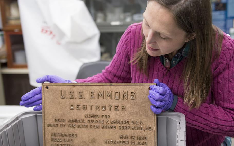 Naval History & Heritage Command lead conservator Shanna Daniel talks about the USS Emmons Destroyer builder’s plaque.