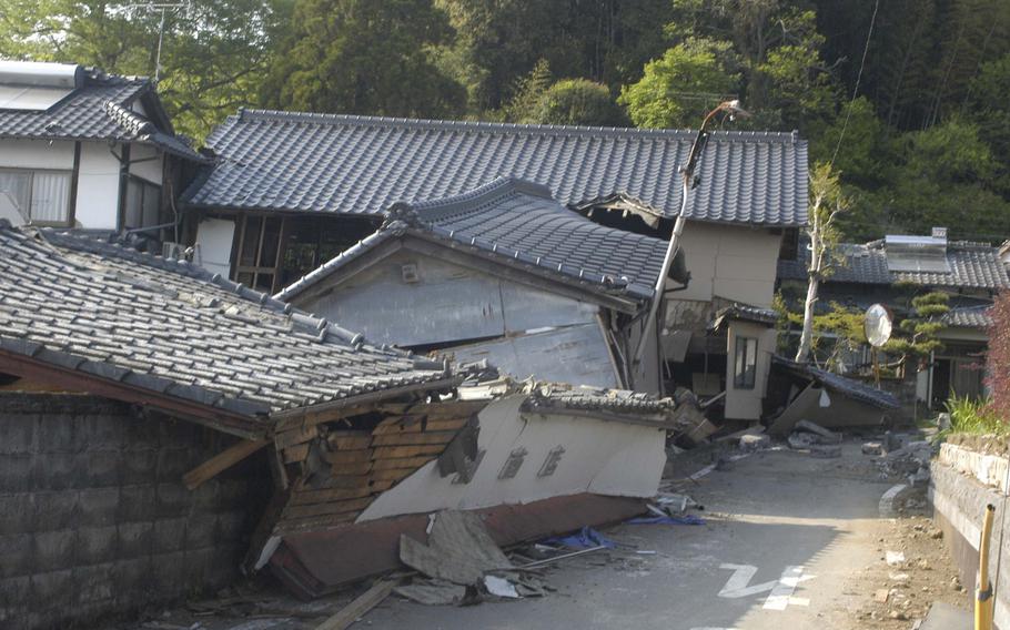Earthquake damged houses near Kumamoto, Japan, on Tuesday, April 19, 2016.  Thousands of Japanese people have been sleeping in the streets since two earthquakes hit the region last week. 


