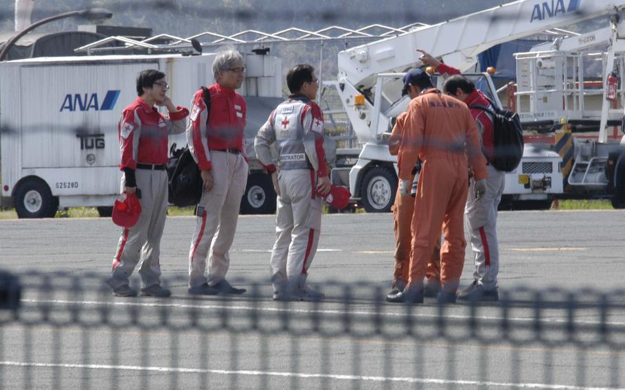 Medical personnel arrive at Kumamoto Airport on Tuesday, April 19, 2016. More than 40 people have died after two large earthquakes hit the region in 24 hours.




