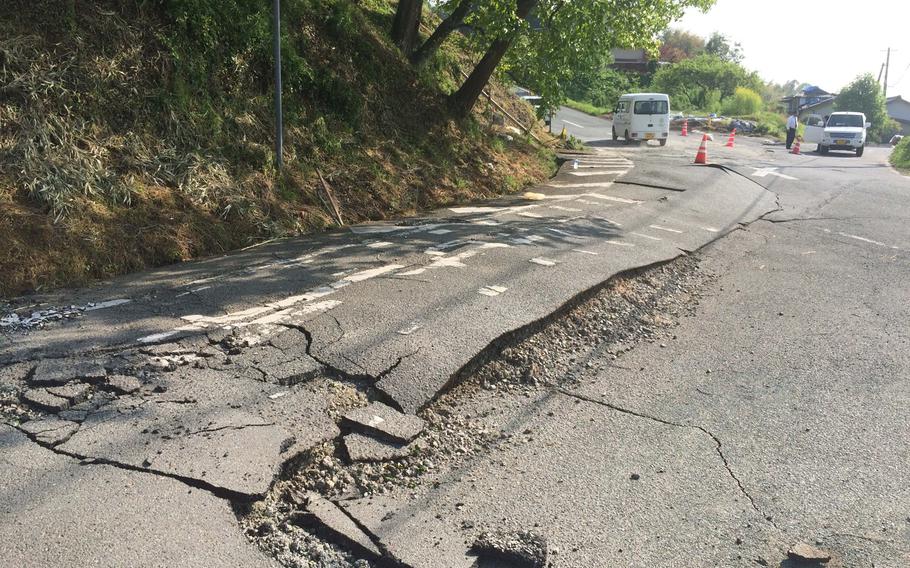 Earthquake damage to a road near Kumamoto, Japan, on Tuesday, April 19, 2016.

