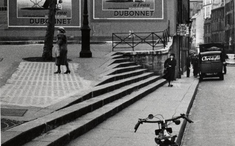 Hungarian-born photographer Andre Kertesz achieved maturity as an artist during the decade he spent in Paris, where he mixed with the great cultural figures of the time. This Paris scene, "Rue Saint-Denis'" (1934), is among photographs in the exhibit "Kertesz: Budapest - Paris - New York," which runs through June 12 at the Pfalzgalerie in Kaiserslautern, Germany.

