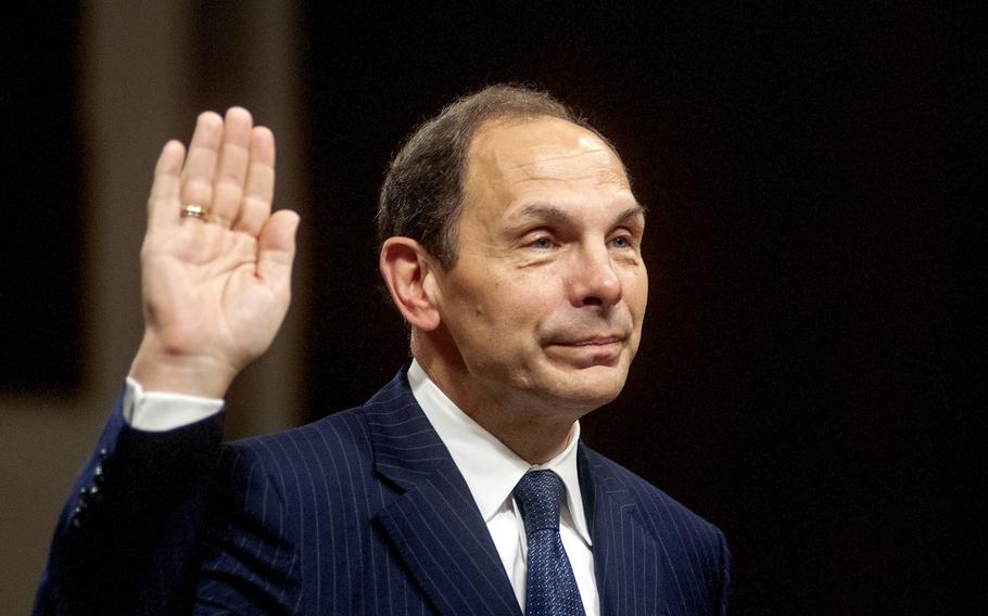 At his confirmation hearing July 22, 2014, then Secretary of Veterans Affairs nominee Robert McDonald raises his hand for an oath before testifying before the Senate Committee on Veterans Affairs. On Wednesday May 25, 2016, Sen. Ted Cruz joined a growing chorus of lawmakers calling for McDonald's resignation.