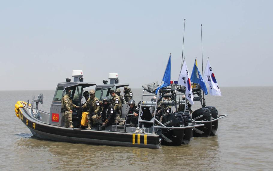 United Nations Command vessels patrol the Han River Estuary, which marks the eastern most portion of the border between North and South Korea, in this undated photo. U.S. and South Korean forces launched a rare operation against illegal fishing Friday, June 10, 2016, amid growing complaints about unauthorized Chinese boats in crab-rich waters near the North Korean border.