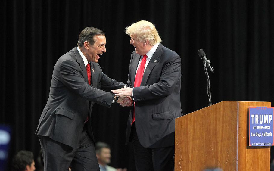Rep. Darrell Issa, R-Calif., greets Republican presidential candidate Donald Trump during a campaign rally at the San Diego Convention Center on Friday, May 27, 2016. 