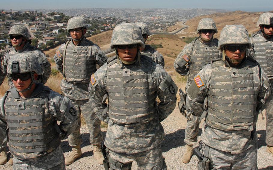 In a September, 2010 file photo, members of the California National Guard stand in formation before undertaking operations on California's southern border.