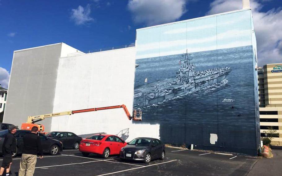 A decision by the management of a Virginia Beach oceanfront hotel to paint over a mural tribute to the Navy has upset residents of the military region. The owner says he had to repair leaks but will have the artist paint a new mural.