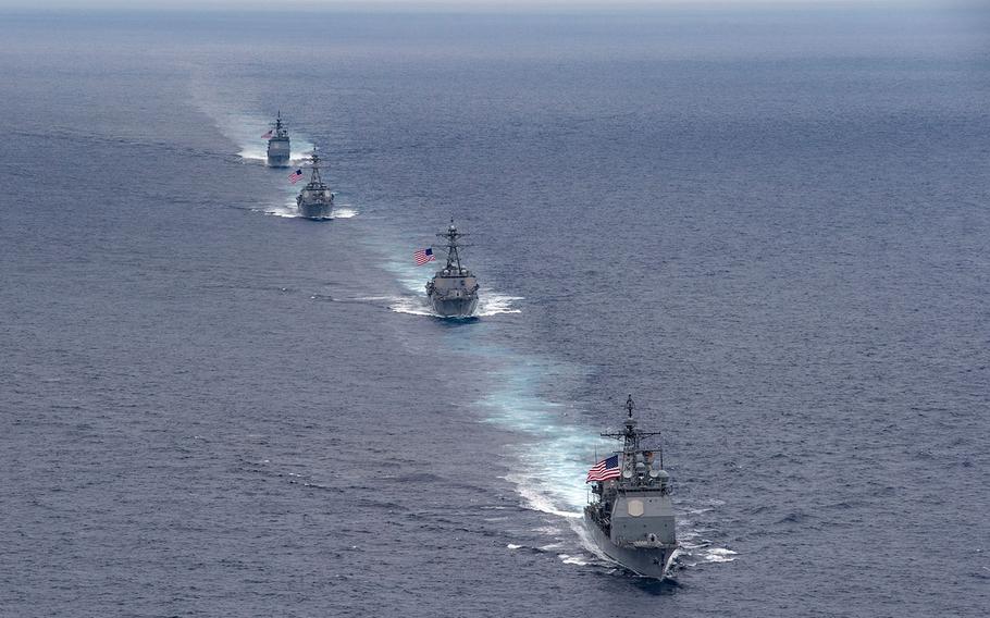 The USS Princeton (CG 59), USS Howard (DDG 83), USS Pinckney (DDG 91) and USS Lake Erie (CG 70), all assigned to Carrier Strike Group 11, steam in formation during a photographic exercise on Aug. 14, 2016.