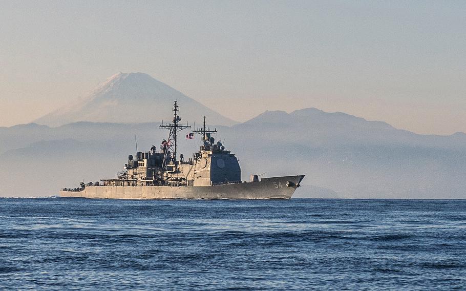 Ticonderoga-class guided-missile cruiser USS Antietam (CG 54) is underway off the coast of Japan near Mt. Fuji on Nov. 22, 2014. According to reports Tuesday, Jan. 31, 2017, the Antietam ran aground off the coast of Japan.