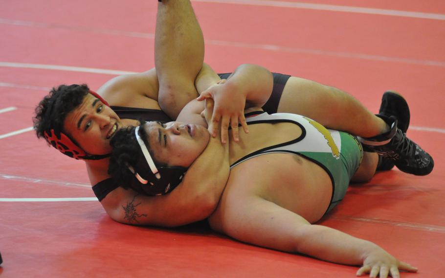 Vilseck's Juan Oestreich has control of Naples' Dominic Dellarosa in a 220-pound match Saturday, Feb. 11, 2017.  Oestreich was Vilseck's lone sectional winner.