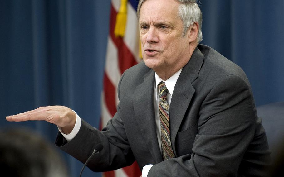 In a 2010 file photo, Under Secretary of Defense Comptroller Robert Hale takes part in a press conference.
